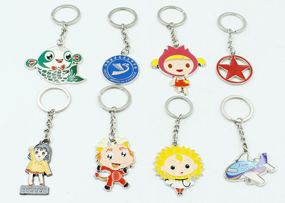 Zinc alloy paint enamel metal fish plane girls key chain cartoon character pendant creative small Yiwu gift
